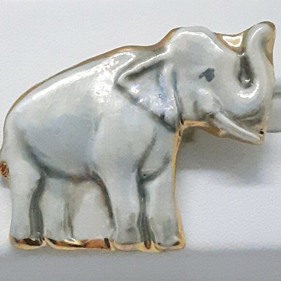 Prosperity Jewelry - NEW Prosperity ceramic elephant pin trimmed in 22kt gold